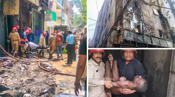 Rescue personnel carry out evacuation operations after a deadly fire at a building housing a restaurant in Delhi's Malviya Nagar.