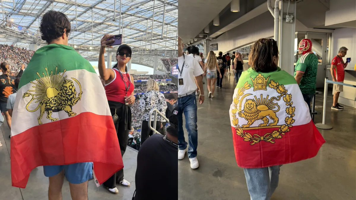 Iran supporters display banned pre-revolutionary flag at FIFA World Cup match vs New Zealand