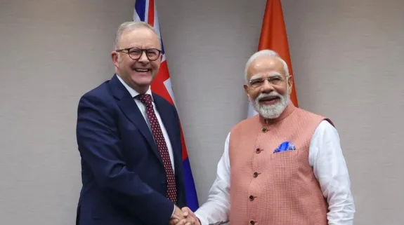 Prime Minister Narendra Modi shakes hands with Australian Prime Minister Anthony Albanese during a bilateral meeting.